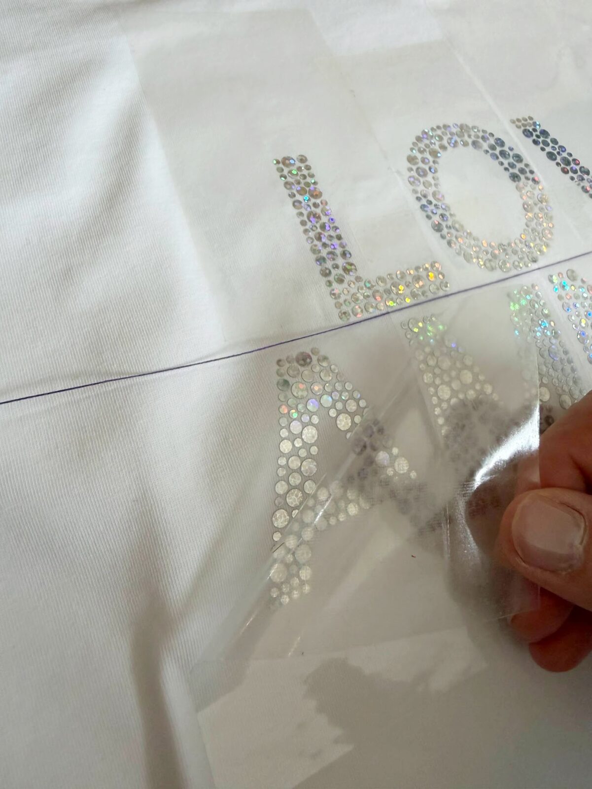 当て布をしてアイロンで圧着しているところ