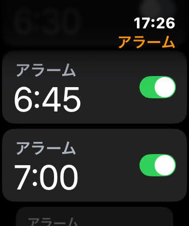 お店の決済端末にApple Watchをかざしてお支払いをしているところ。画面に取引完了と表示されている